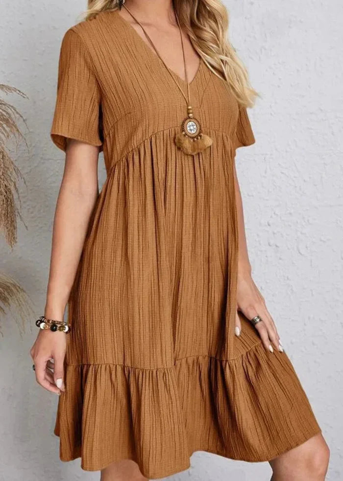 Vestido elegante favorecedor para el vientre.