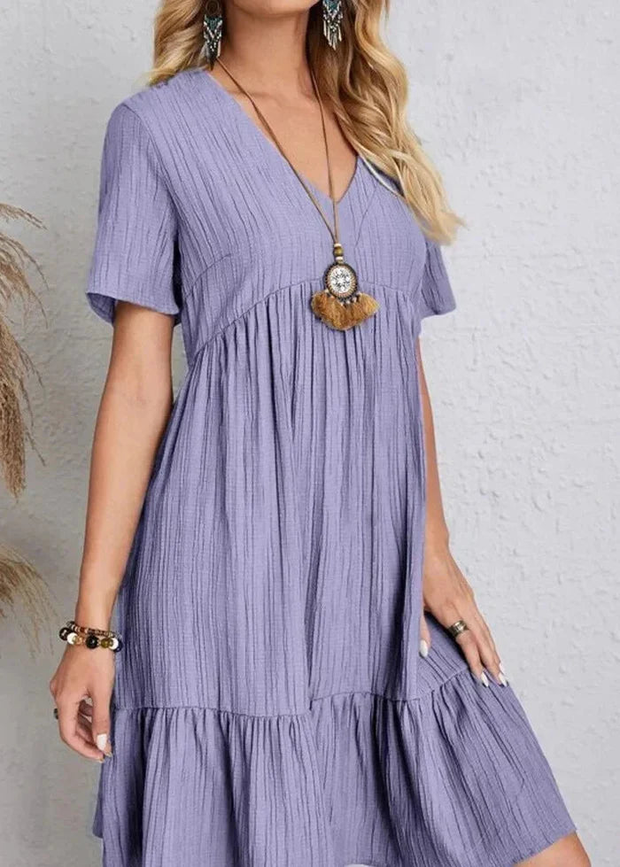 Vestido elegante favorecedor para el vientre.