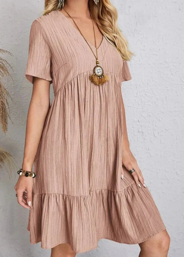 Vestido elegante favorecedor para el vientre.