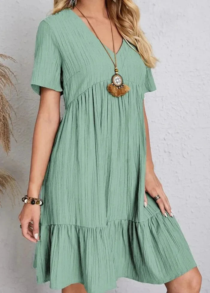 Vestido elegante favorecedor para el vientre.
