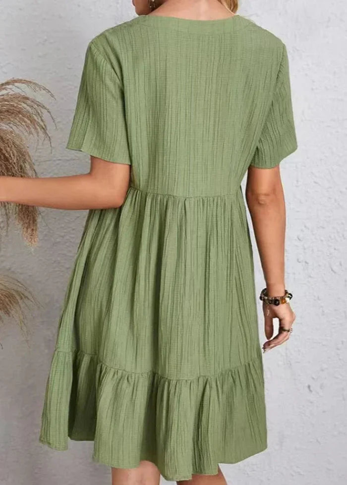 Vestido elegante favorecedor para el vientre.