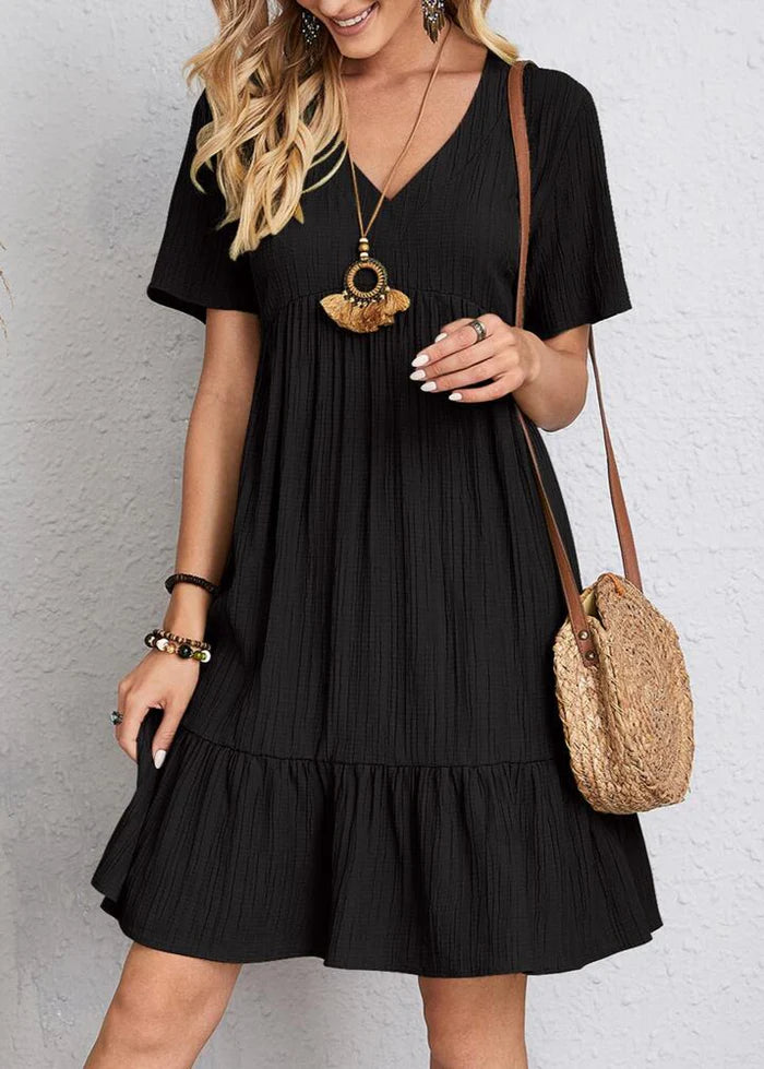 Vestido elegante favorecedor para el vientre.
