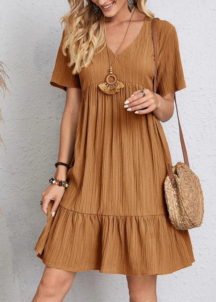 Vestido elegante favorecedor para el vientre.