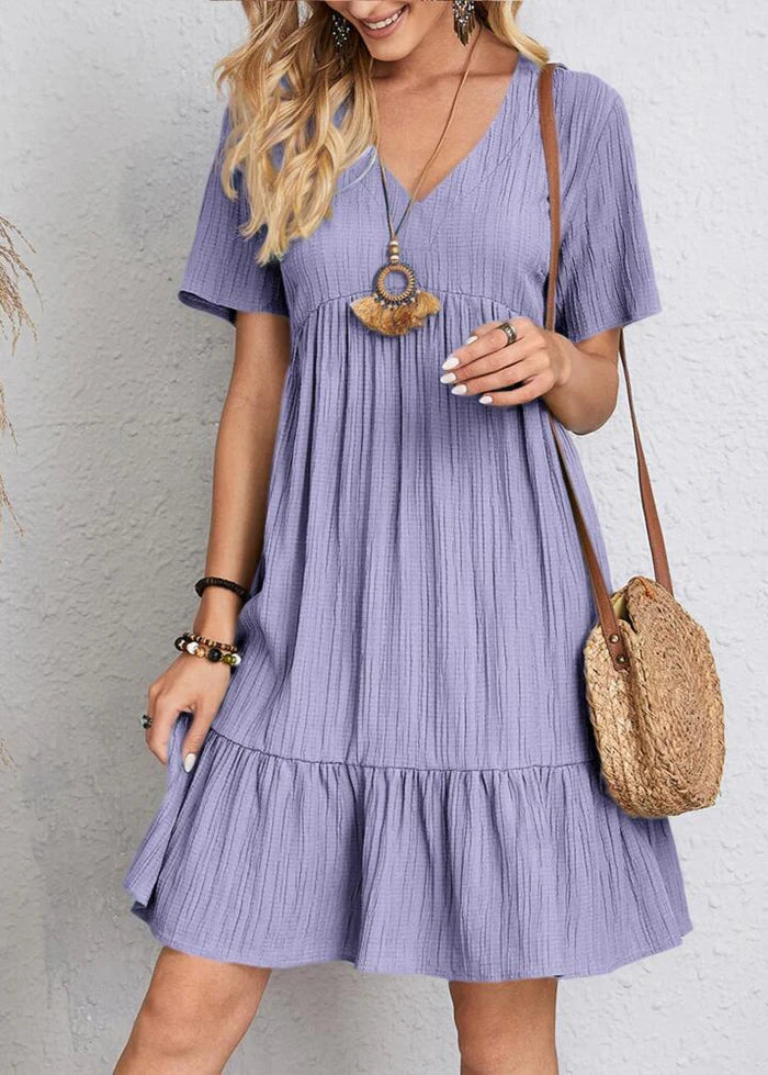 Vestido elegante favorecedor para el vientre.