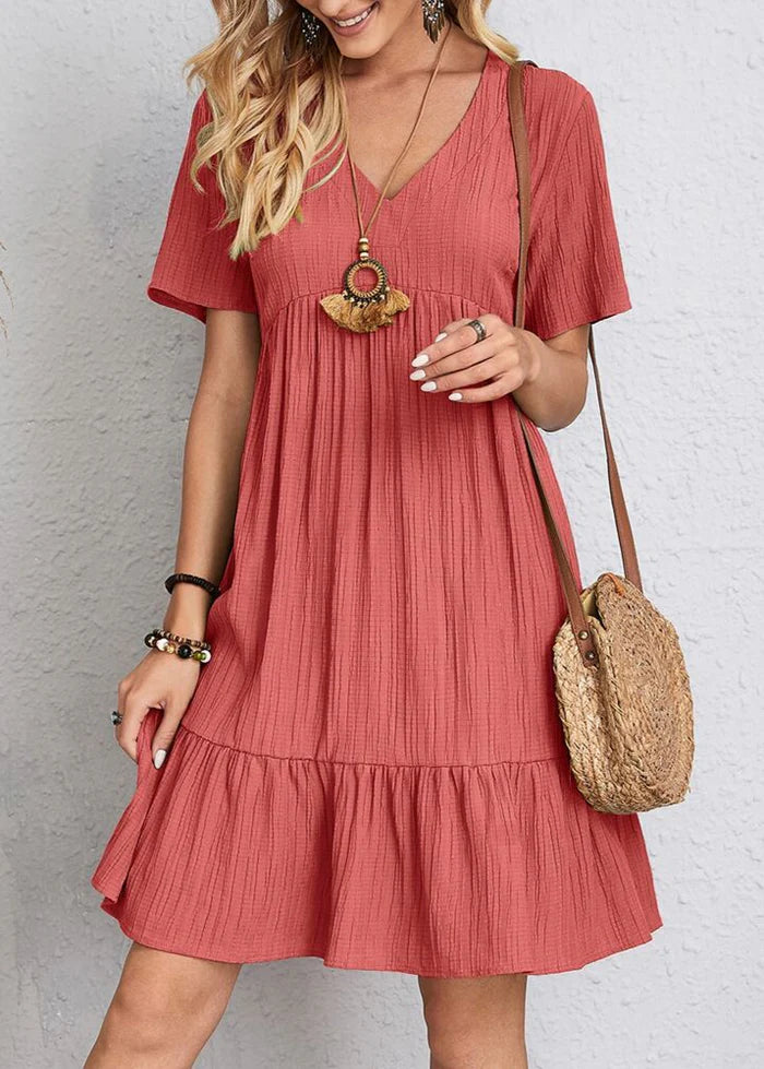 Vestido elegante favorecedor para el vientre.